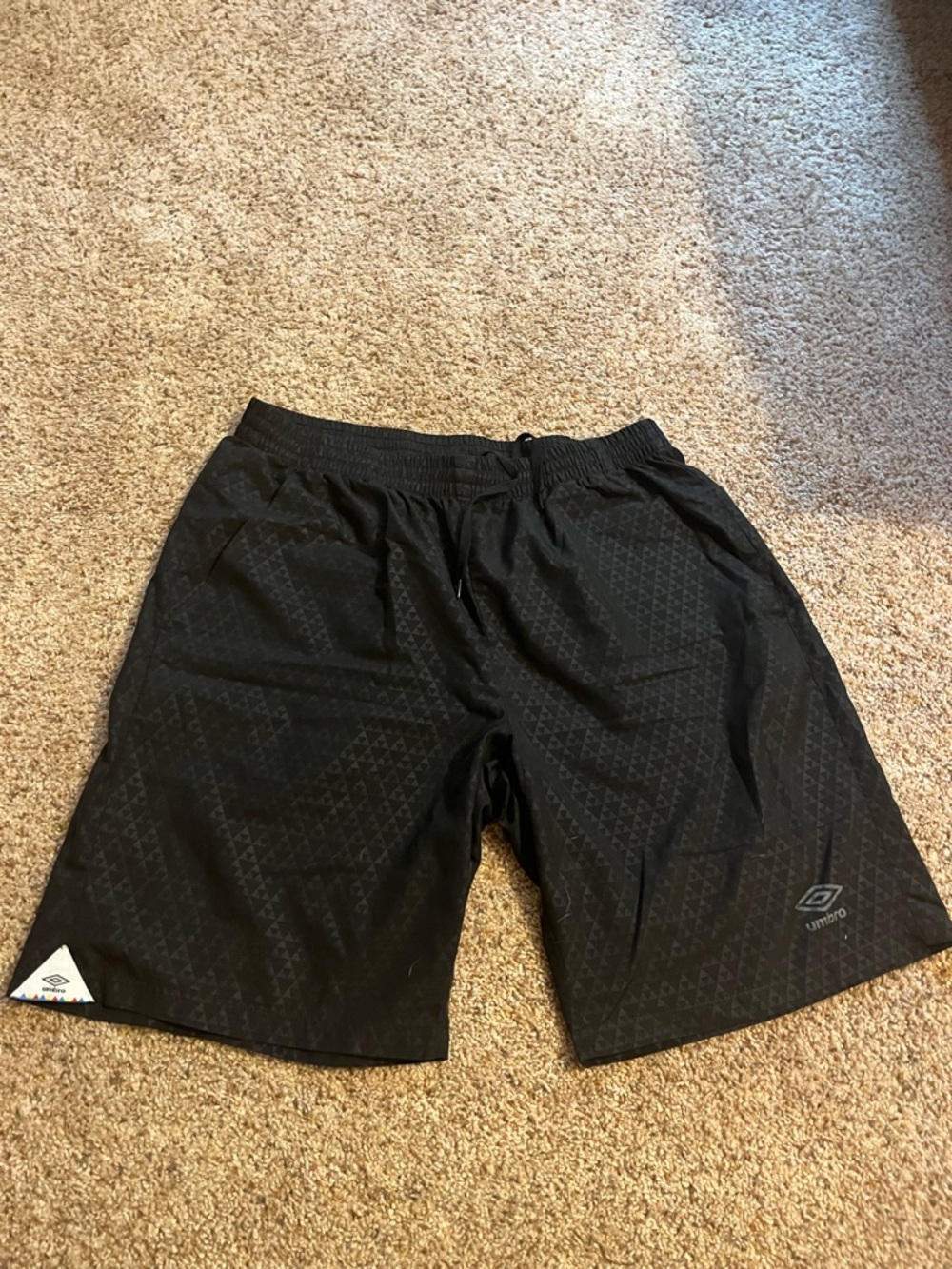 Umbro Black Men's Athletic Shorts with Subtle Pattern